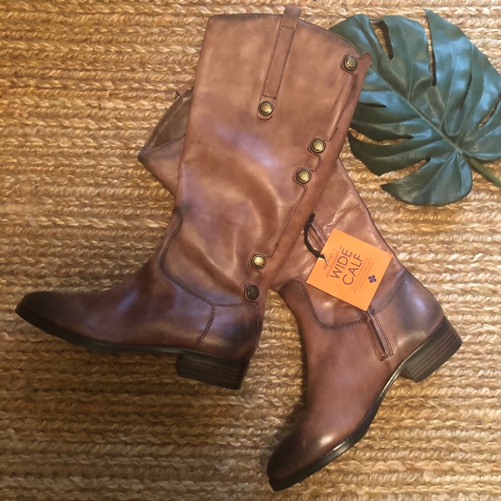 Buttery soft leather with brass embellishments